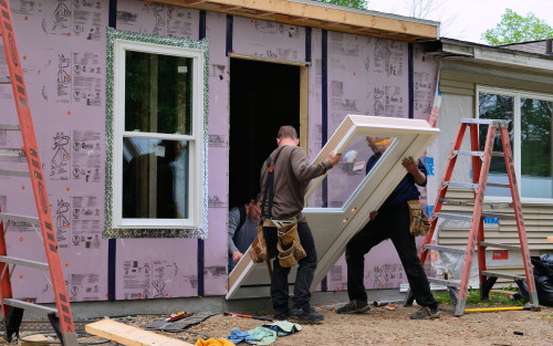 In goes our new back door.