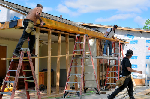 The second beam is moved into place.