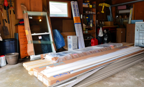 Windows, siding, trim, and miscellaneous lumber now occupy one bay of our garage.