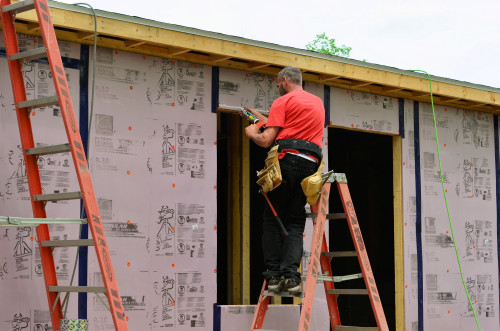 Running a bead of caulk.