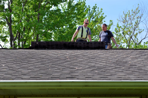 Peeling back the roof cap.