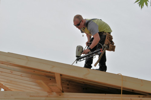 Pop! Pop! Pop! Thye sound of pneumatic nail guns is the sound of progress on our addition.