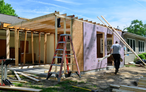 The door and window are framed in.