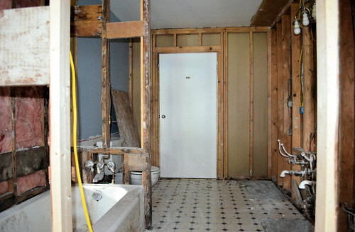 Gutted! View from new shower room into the old bathroom.