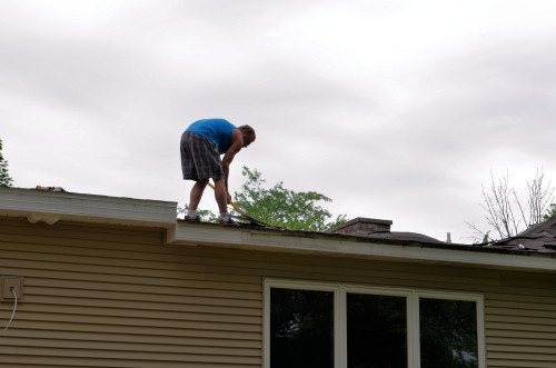 Removing old shingles.