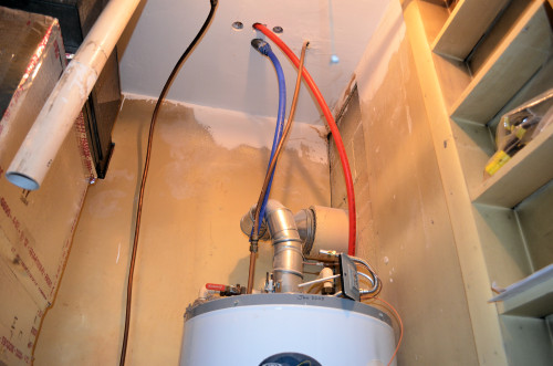 New water lines in the utility closet.