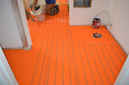 Heating wires in the bathroom floor.