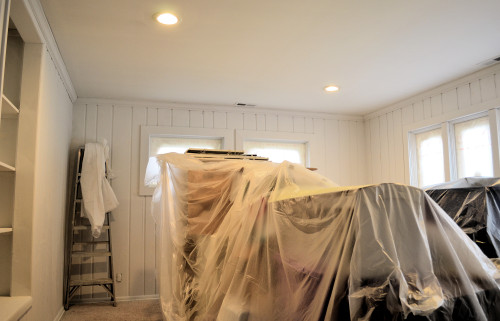 The dark pine paneling is now well-hidden.